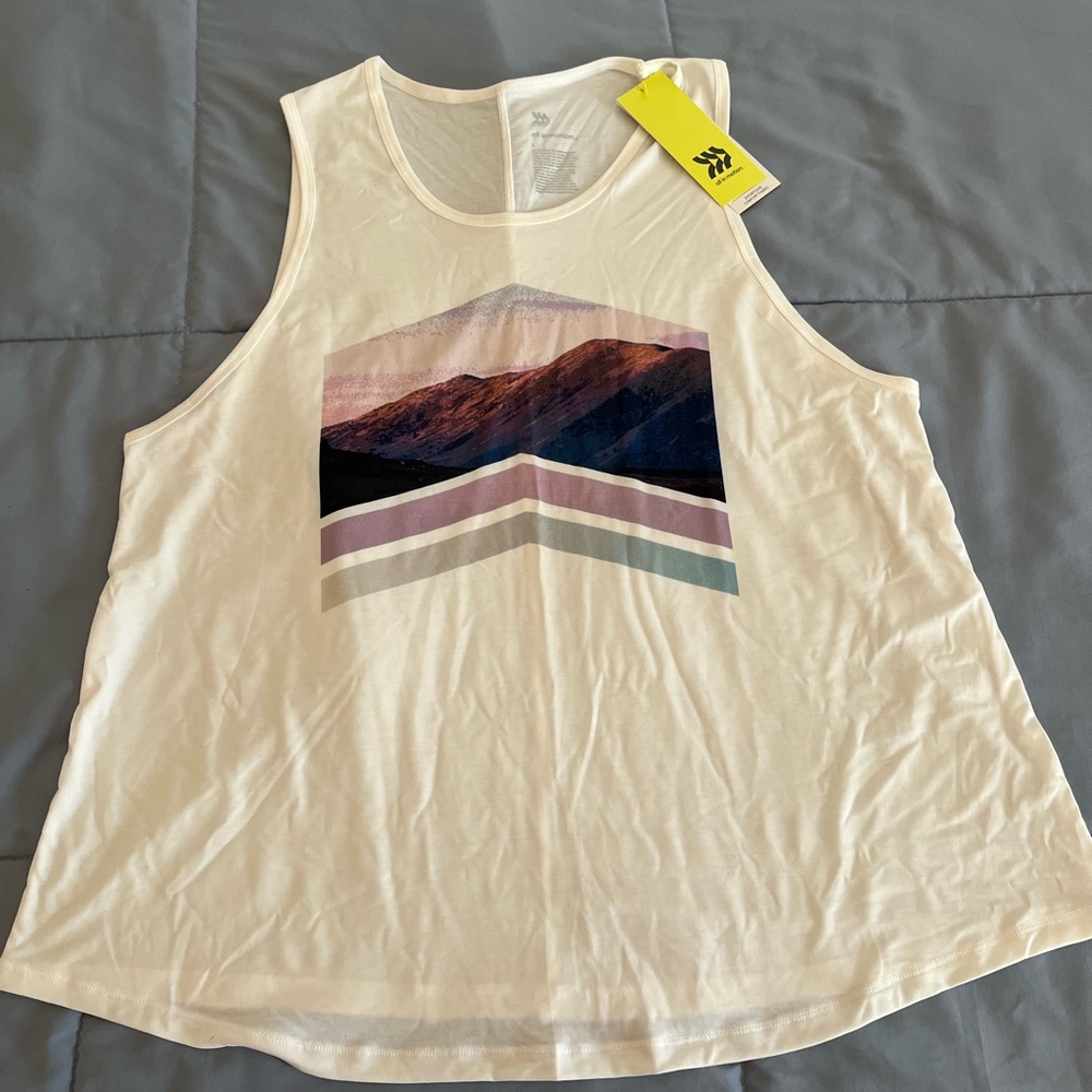 All in Motion Cream Pink Relaxed Graphic Tank Top